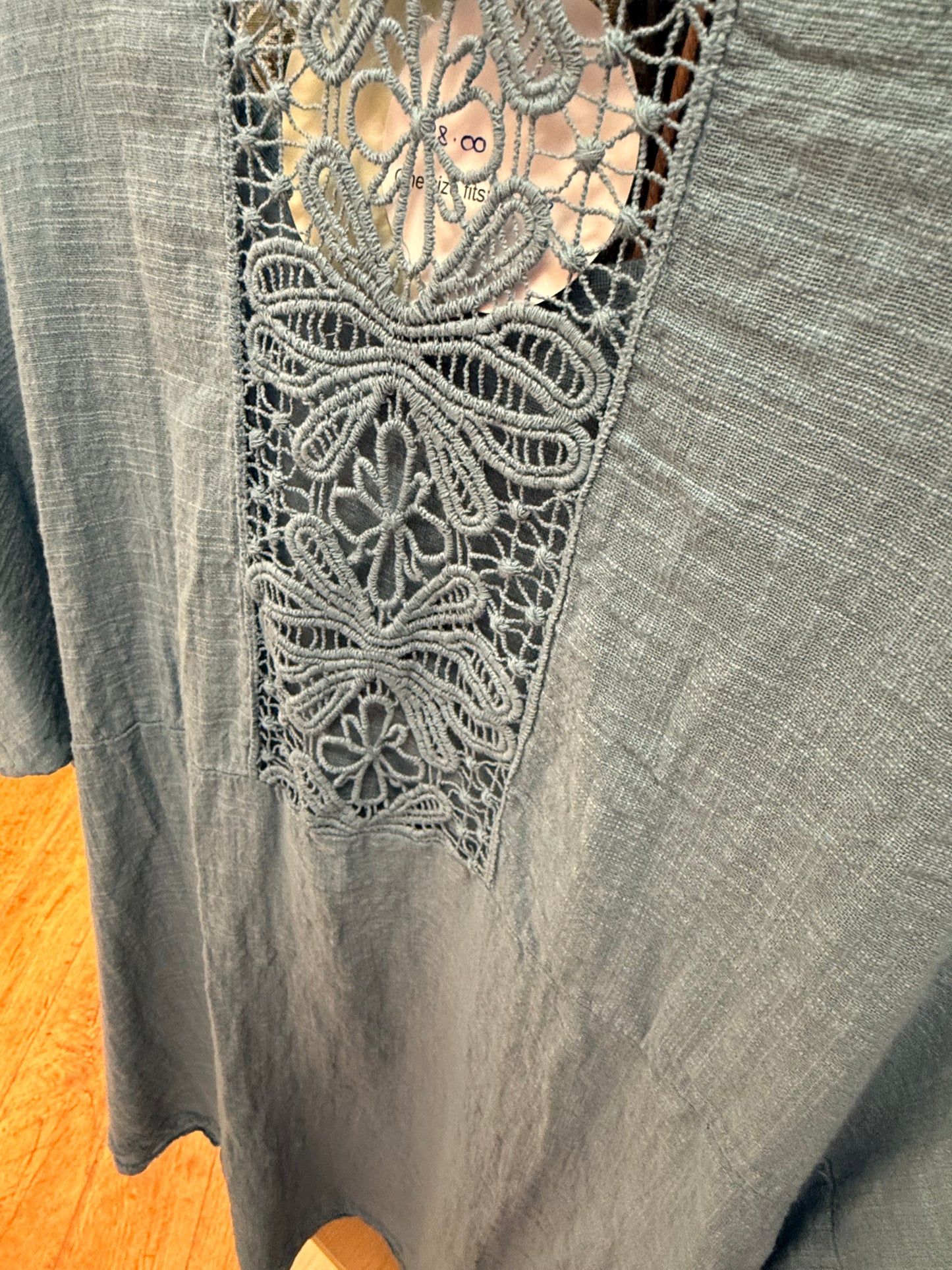 Linen top with crochet detail. One size fits 12-22