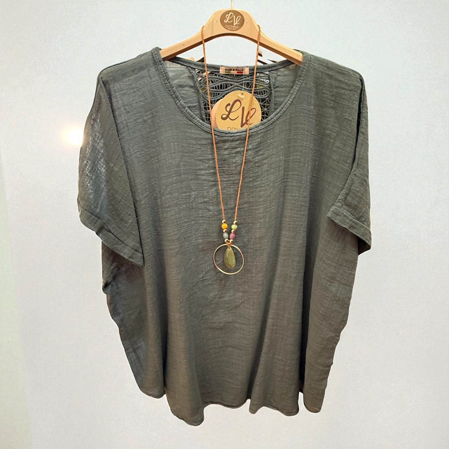 Linen top with crochet detail. One size fits 12-22